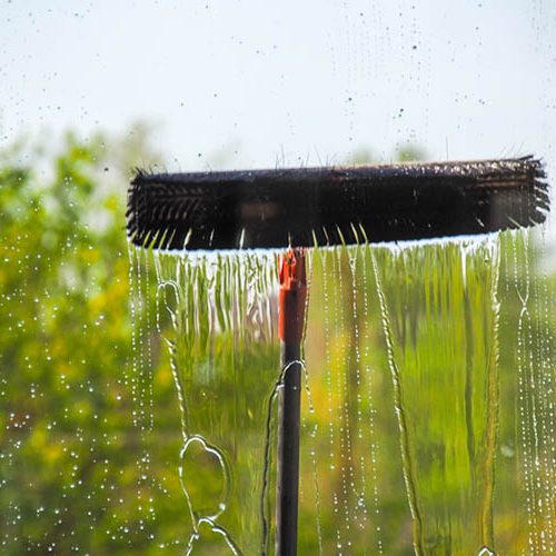 Reach and wash window cleaning